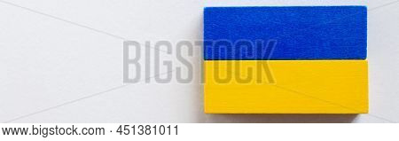 Top View Of Tetragonal Blue And Yellow Blocks On White Background, Ukrainian Concept, Banner.