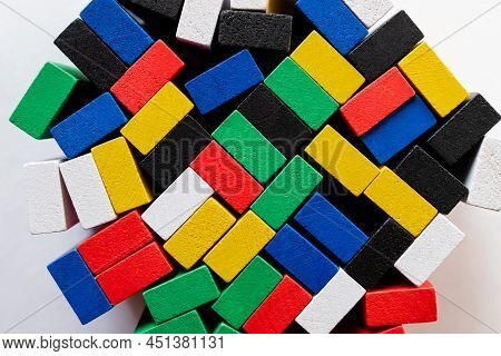 Top View Of Tetragonal Multicolored Blocks On White Background.