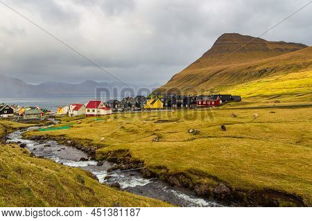 Gjogv, Faroe Islands, Denmark - 05 May 2018: Small Village Gjogv Situated On The Slope Of The Mounta