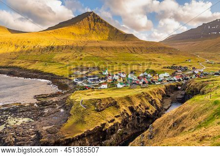 Gjogv, Faroe Islands, Denmark - 05 May 2018: Small Village Gjogv Situated On The Slope Of The Mounta