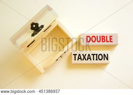 Double Taxation Symbol. Concept Words Double Taxation On Wooden Blocks On A Beautiful White Table Wh