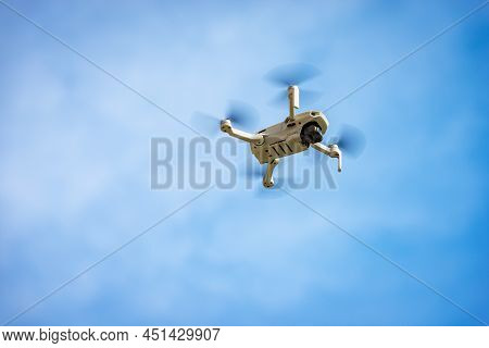 Molveno, Italy - March 2, 2022: Dji Mavic Mini Quadcopter Camera Drone. Ultralight Small White Drone