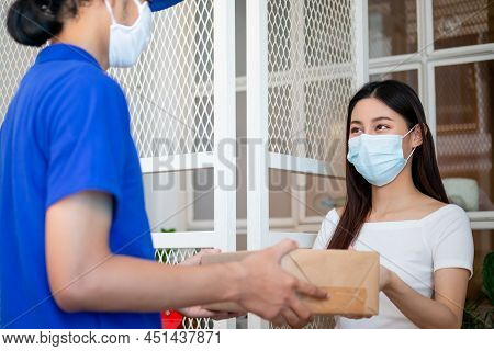 Asain Young Woman, Client Received A Delivery Of Cardboard Box, Parcel From Delivery, Postman, Weari