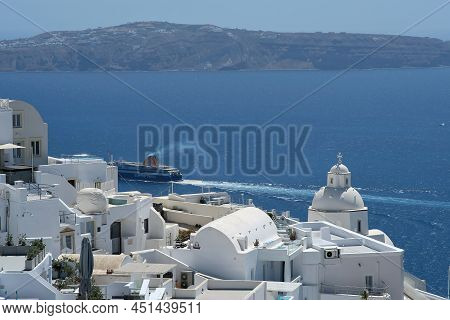 Santorini, Greece - May 10, 2021 : The Whitewashed Picturesque Church And Villas Of Fira Santorini A