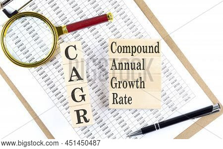 Cagr Text On A Wooden Block On Chart Background