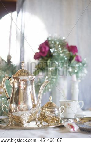 Tea Break In English Style, Vintage Silver Service Against The Flowers