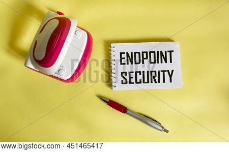 Endpoint Security Text On Notepad And Yellow Background. Business Concept