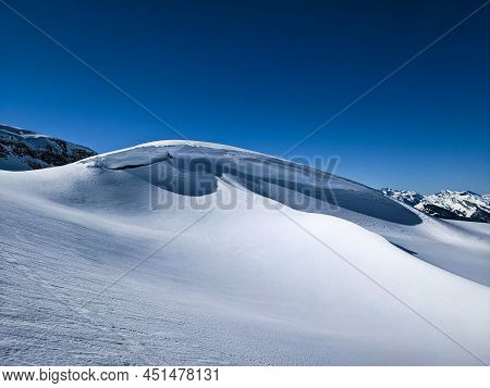 Ski Tour In Switzerland. Mountaineering With Ski On The Mountain Silberen In The Canton Of Glarus Ur