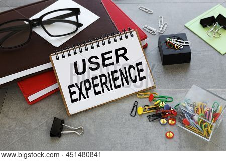 User Experience Design - Text On Notepad Near Red And Brown Notepad