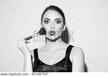 Beauty Portrait Of Beautiful Female Model With Make Up Brush With Powder. Woman With Beauty Face, Na