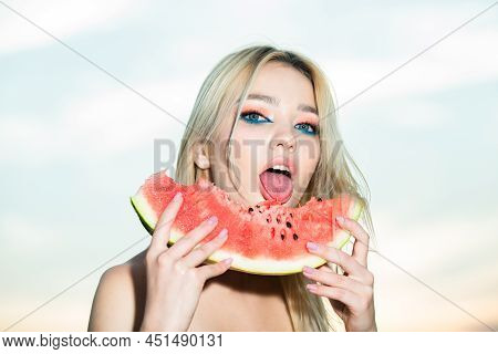 Sexy Summer Tropical Fruit. Sensual Young Woman Lick Watermelon With Sexy Tongue. Summer Taste. Chee
