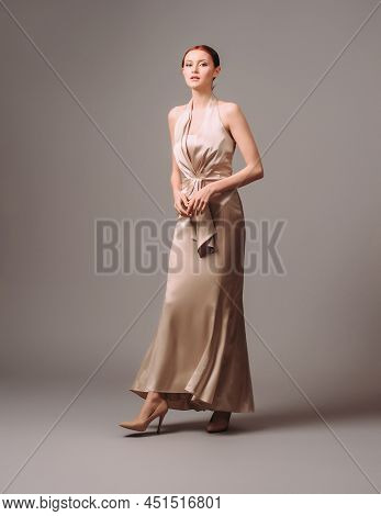 Bridesmaid's Dresses. Elegant Moscato Dress. Beautiful Ivory Silk Evening Gown. Studio Portrait Of Y