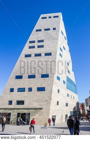 Groningen, Netherlands - March 19, 2022: People Walking In The Spring Sun Along The Tower Of The For