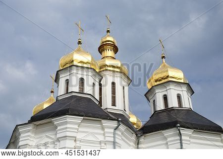 Gilded Domes Of An Ancient Orthodox Church Against The Sky. Catherine's Church