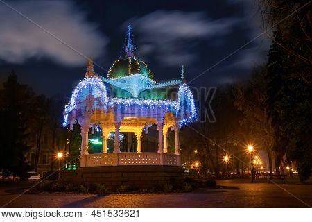 Carved Wooden Romantic Gazebo - Altanka - Symbol Of Sumy City, Ukraine. Scenic Night View Of Gazebo 