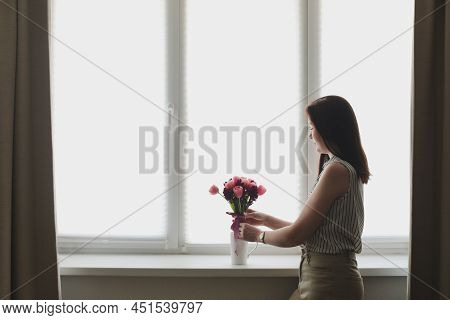 Young Woman With A Pink Tulip Bouquet At Home. Spring Stll Life, Birthday, Easter Concept.