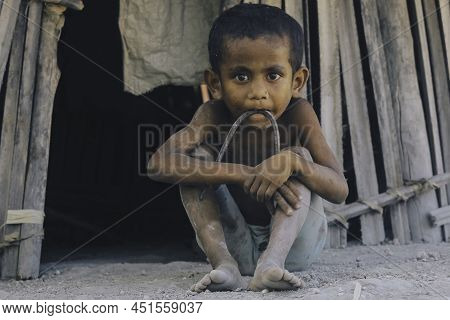 A Portrait Of Children With A Shabby Look In A Poor And Isolated Village Of Rote Island, East Nusa T