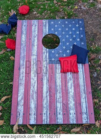 Red White And Blue Cornhole Game With Stars To Look Like An American Flag With Bean Bags