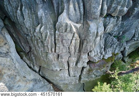 Aerial View Of Large Rocky Formations With Snone Boulders And Mountain High Cliffs.