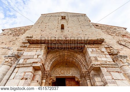 Tuscany - Italy. June 04, 2021: The Portal, Decorated With Animal And Vegetable Motifs Of Abbey Sant