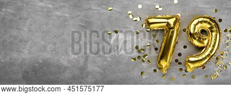 Yellow Foil Balloon Number, Number Seventy Nine On A Concrete Background. Greeting Card With The Ins