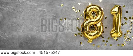 Yellow Foil Balloon Number, Number Eighty One On A Concrete Background. Greeting Card With The Inscr