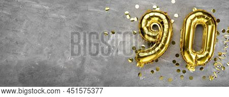 Yellow Foil Balloon Number, Number Ninety On A Concrete Background. Greeting Card With The Inscripti
