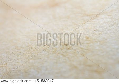 Extreme Closeup Of Beige Handmade Paper With Shallow Deph Of Field.