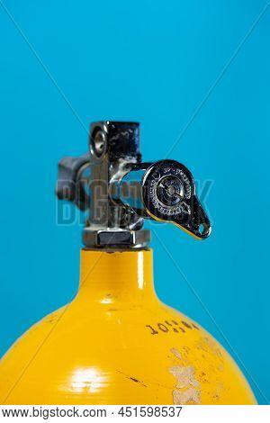 J Valve In The Open Position On A Vintage Yellow Steel Scuba Tank