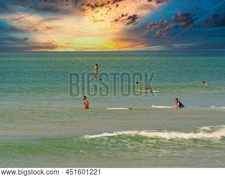 Somone, Senegal - November Circa, 2021. Unidentified Beginner Surfers On Sea , Trying To Find Good E