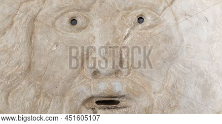 Mouth Of Truth Sightseeing In Rome, Italy. Historical Sculpture Made Of Marble With Antique Face Ful
