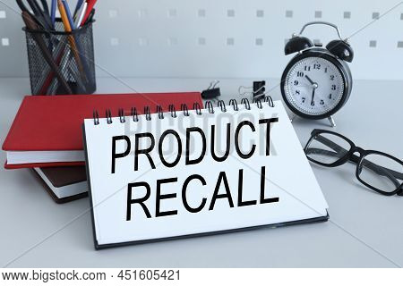 Work Table And Stickers On The Dost. Notepad Text On Page Product Recall
