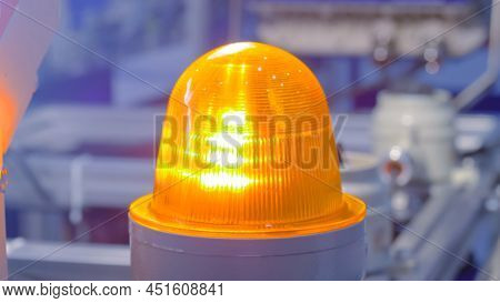 Close Up Of Orange Alarm Lamp Signal Warning Flashing Light For Industrial Machinery At Emergency, S