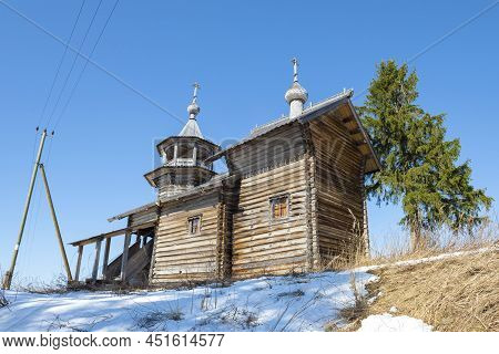 Ancient Wooden Chapel Of The Nativity Of The Virgin (1751-1800) On A Sunny April Day. Manga Village,
