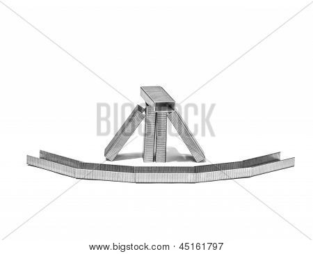 Fence From Staples Isolated On White Background