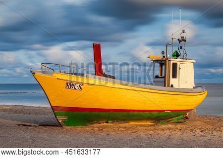 Rewal, Poland - Circa August 2021: Fishing Boat On The Beach In Rewal Circa August 2021 In Rewal.