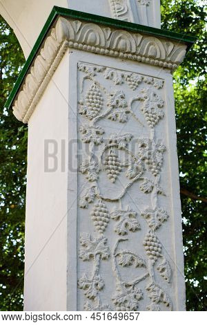 A Stone Column Supports The Gate With A Grape Pattern Of The Klimentovsky Cave Monastery. Inkerman. 
