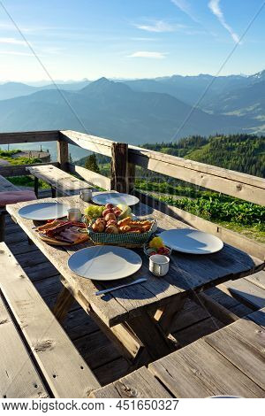 Breakfast In A Traditional Hutte In Tirol Alms With Fruits And Wurst