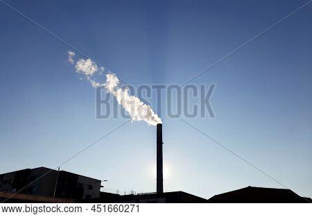 Bucharest, Romania - January 14, 2022: Chimney Of Cet Progresul Power Plant, Pollute With Smoke From