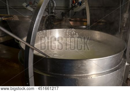 Process Of Making Fresh White Soft Ricotta Whey Cheese On Small Cheese Farm In Parma, Italy