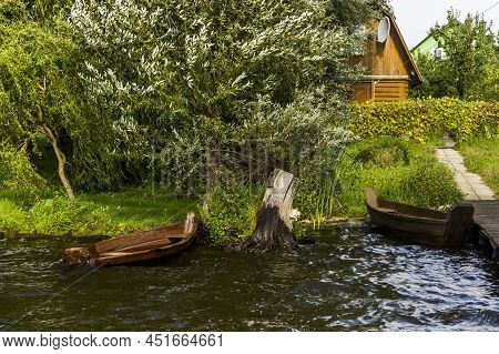 Old Wooden Boat On The Lake