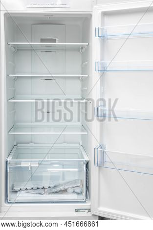 New Clean Refrigerator. Opened Empty Refrigerator. Refrigerator Open Empty Fridge Inside Interior. C