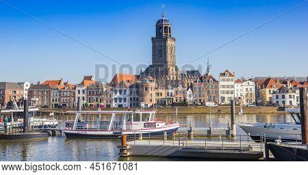 Deventer, Netherlands - March 03, 2022: Boats At The Riverbank Of The Ijssel River In Deventer, Neth