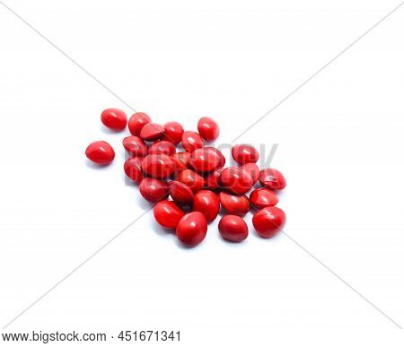 Red Seeds Of 'adenanthera Pavonina'(manjadi) With White Background.