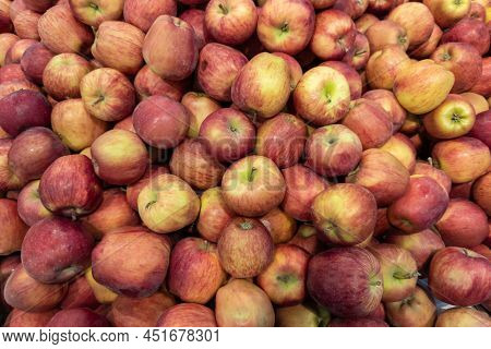 Full-frame View Of Unadorned Pile Of Red Apples In A Grocery Store.