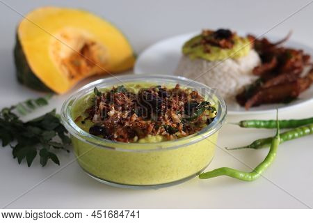 Coconut Based Pumpkin Curry. A Pumpkin Side Dish To Go With Rice, Part Of Kerala Meals. Commonly Kno