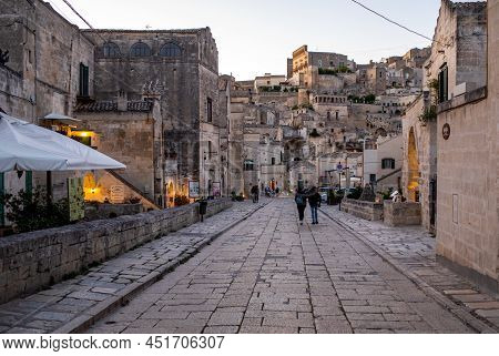 Matera, Italy - September 20, 2019: Evening View Of The City Of Matera, Italy, With The Colorful Lig