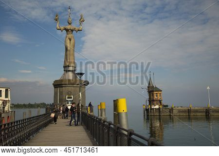 Konstanz,  Germany , 20 May 2019.  View Of The Old Lighthouse And Statue Of Imperia In Harbor Of Kon