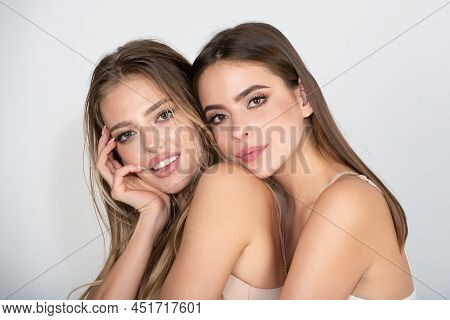Beautiful Women With Beauty Makeup And Cosmetics. Close-up Of Couple Beautiful Girlfriends Models. T