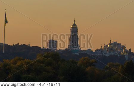 Beautiful A View Of Pechersk Lavra In Kyiv At Sunrise. A Unesco World Heritage Site In Ukraine. View